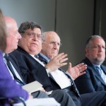 A photograph of panelists at the Moment/Newseum discussion in conversation