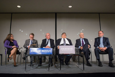 A photograph of panelists at the Moment/Newseum discussion