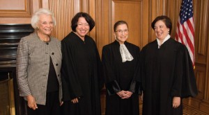 Ruth Bader Ginsburg standing with other women