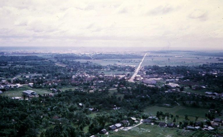 Aerial View Of Cu Chi District Town Center With Sprawling Us 25th