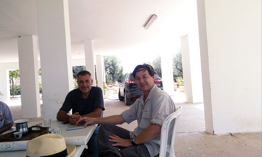 Author Arieh O’Sullivan with Mohammed al-Azza (left), whose ancestors once owned the castle