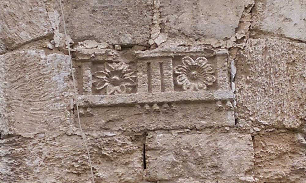 Roman-era carved details on the pillars of the Khan of Ajjur