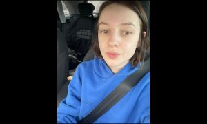Anya sits in her car as she leaves Kyiv
