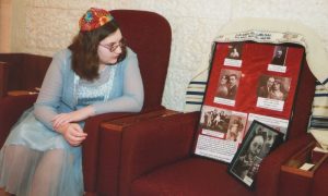 Ariella Livstone with photos of the Lipstein family.