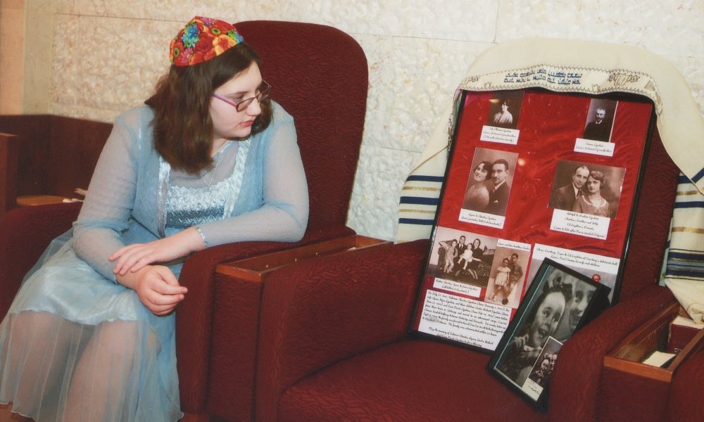 Ariella Livstone with photos of the Lipstein family.