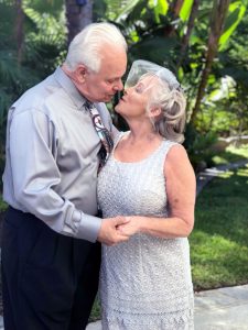 An old couple celebrates their wedding.