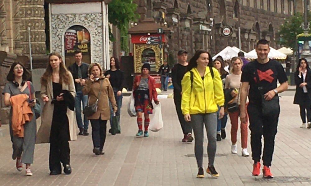 Locals walks the streets of Kyiv