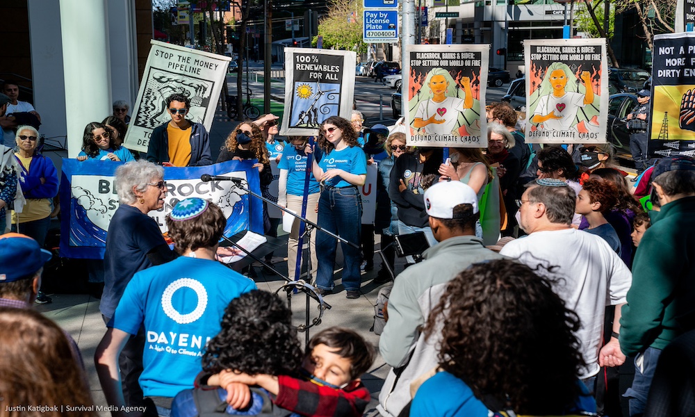 Students and community members gather in front of BlackRock’s building in downtown San Francisco on Tuesday April 19, 2022.