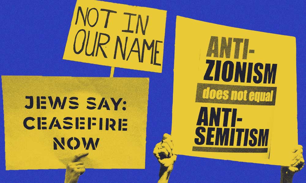 An illustrative image of three yellow anti-zionist protest signs held in front of a blue background.