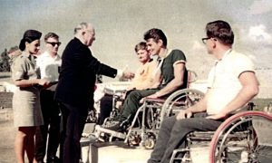 Ludwig Guttmann presenting the gold medal to Tony South at 1968 Paralympics in Tel Aviv