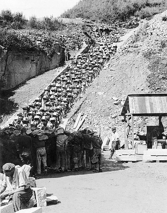 Prisoners forced to carry granite blocks up 186 "Stairs of Death" to the top of the quarry.