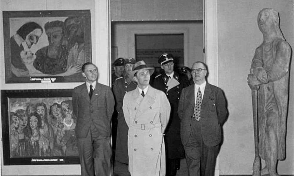 Joseph Goebbels views the 1937 Degenerate Art exhibition.