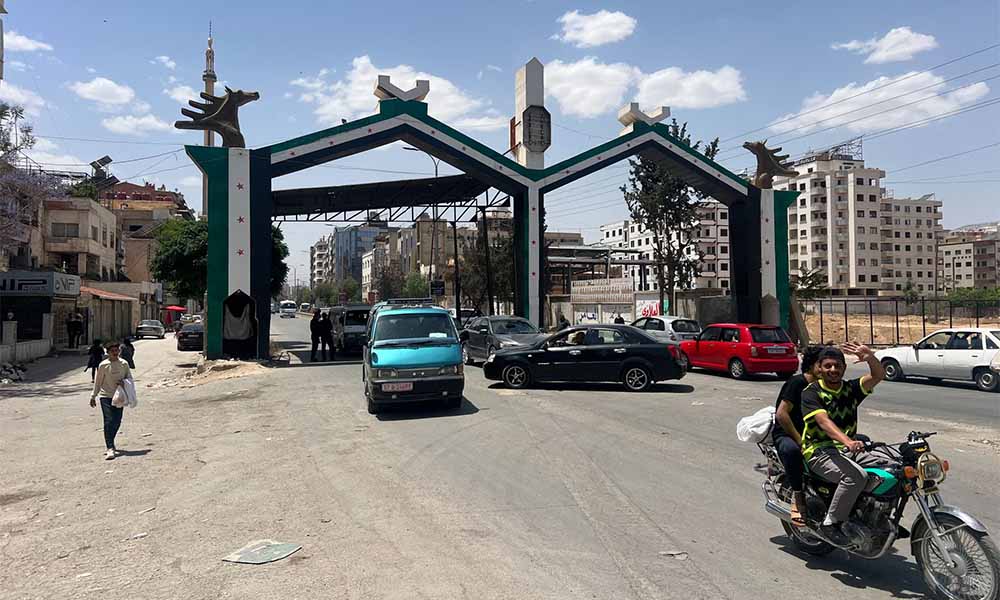 checkpoint at the entrance to Ashrafiyat Sahnaya, Syria